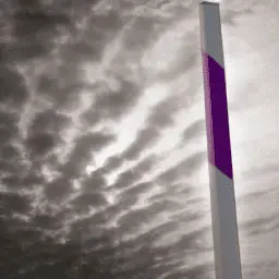 A purple and white stop sign in front of a cloudy sky.